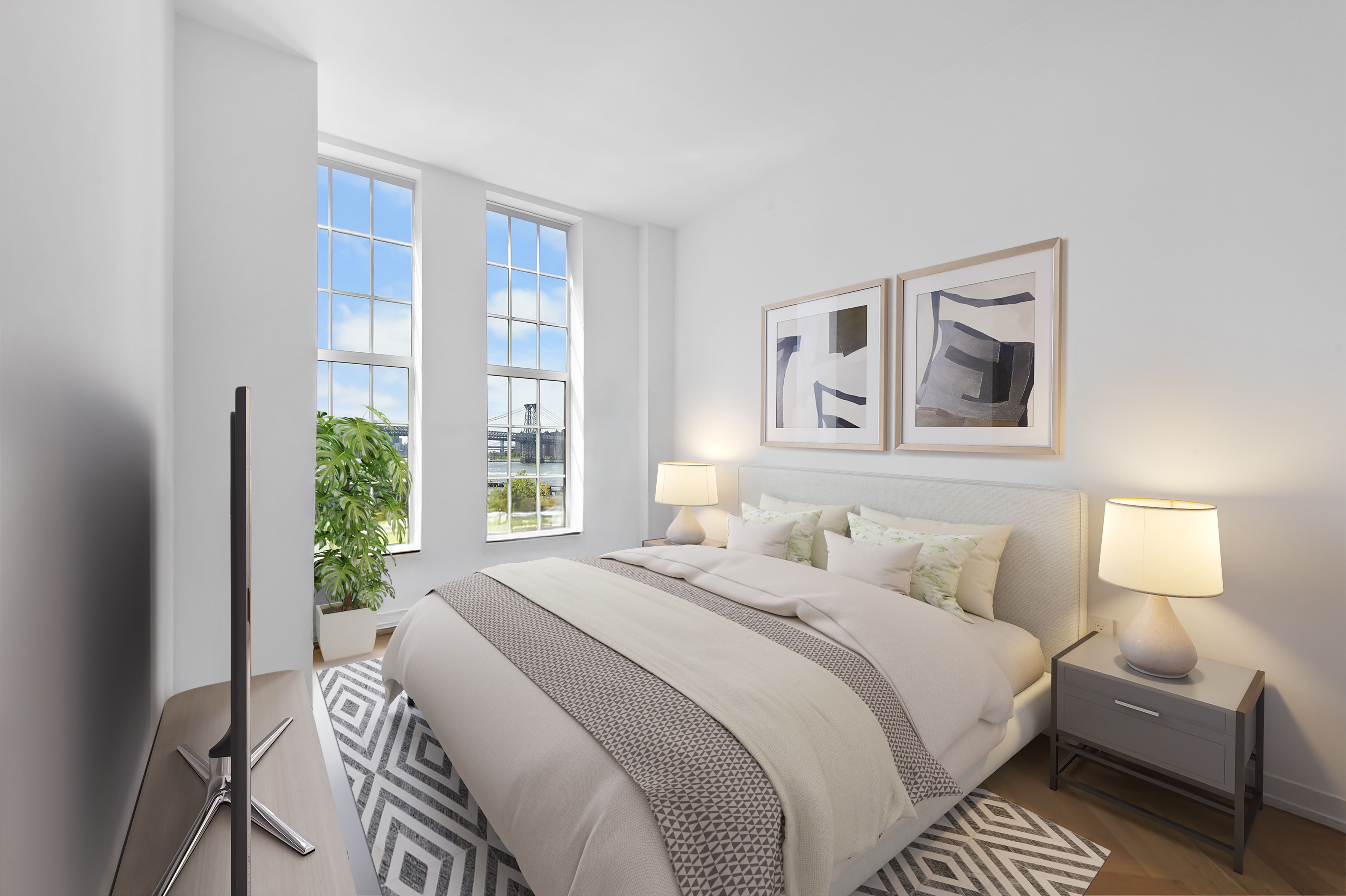 184 Kent Avenue, Unit B407 Brooklyn, NY 11249 - Photo 4 of 14 a bedroom with a bed and a couch