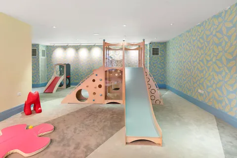 a room with lots of counter top space and windows