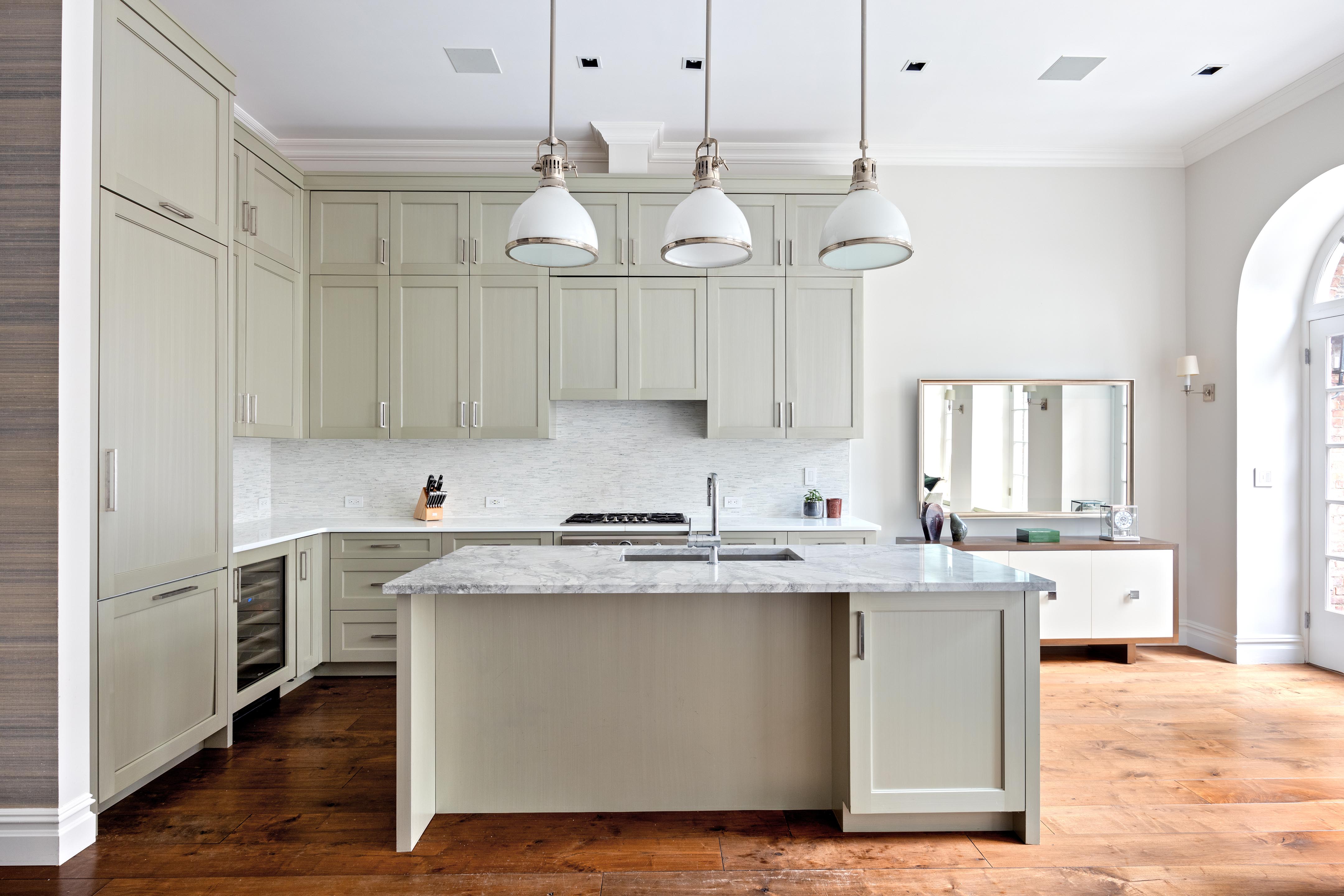 14 West 11th Street, Unit GARDEN Manhattan, NY 10011 - Photo 3 of 18 a kitchen with stainless steel appliances granite countertop a sink stove and refrigerator