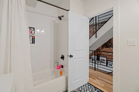 a bedroom with a workspace