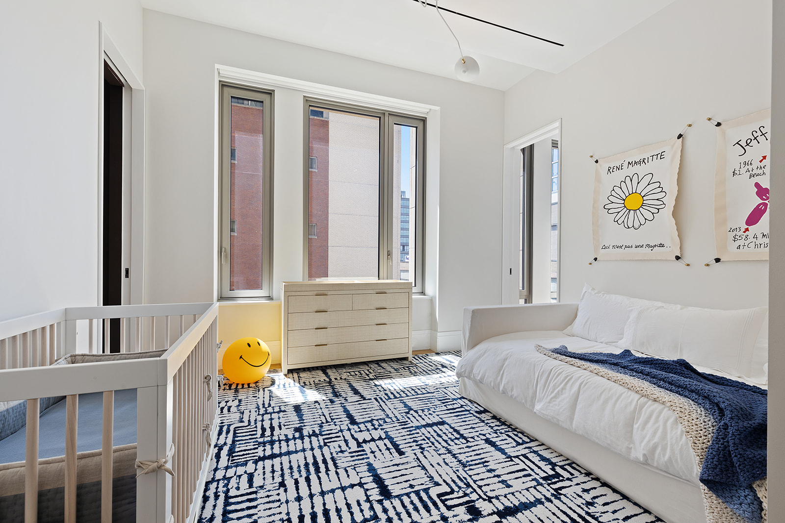 601 Washington Street, Unit 3W Manhattan, NY 10014 - Photo 11 of 15 a bedroom with a bed and a window