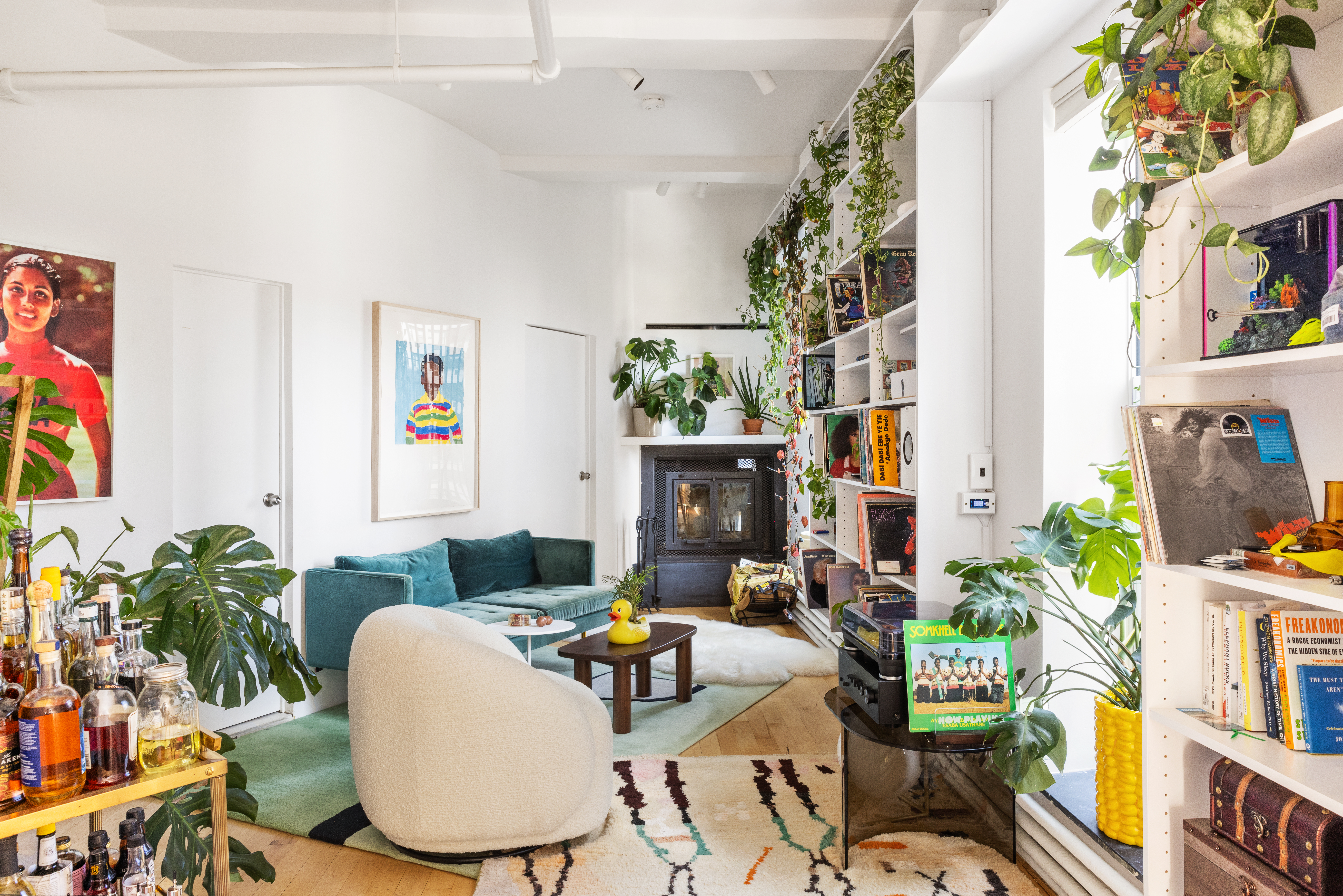59 4th Avenue, Unit 8A Manhattan, NY 10003 - Photo 4 of 12 a living room with furniture and a potted plant