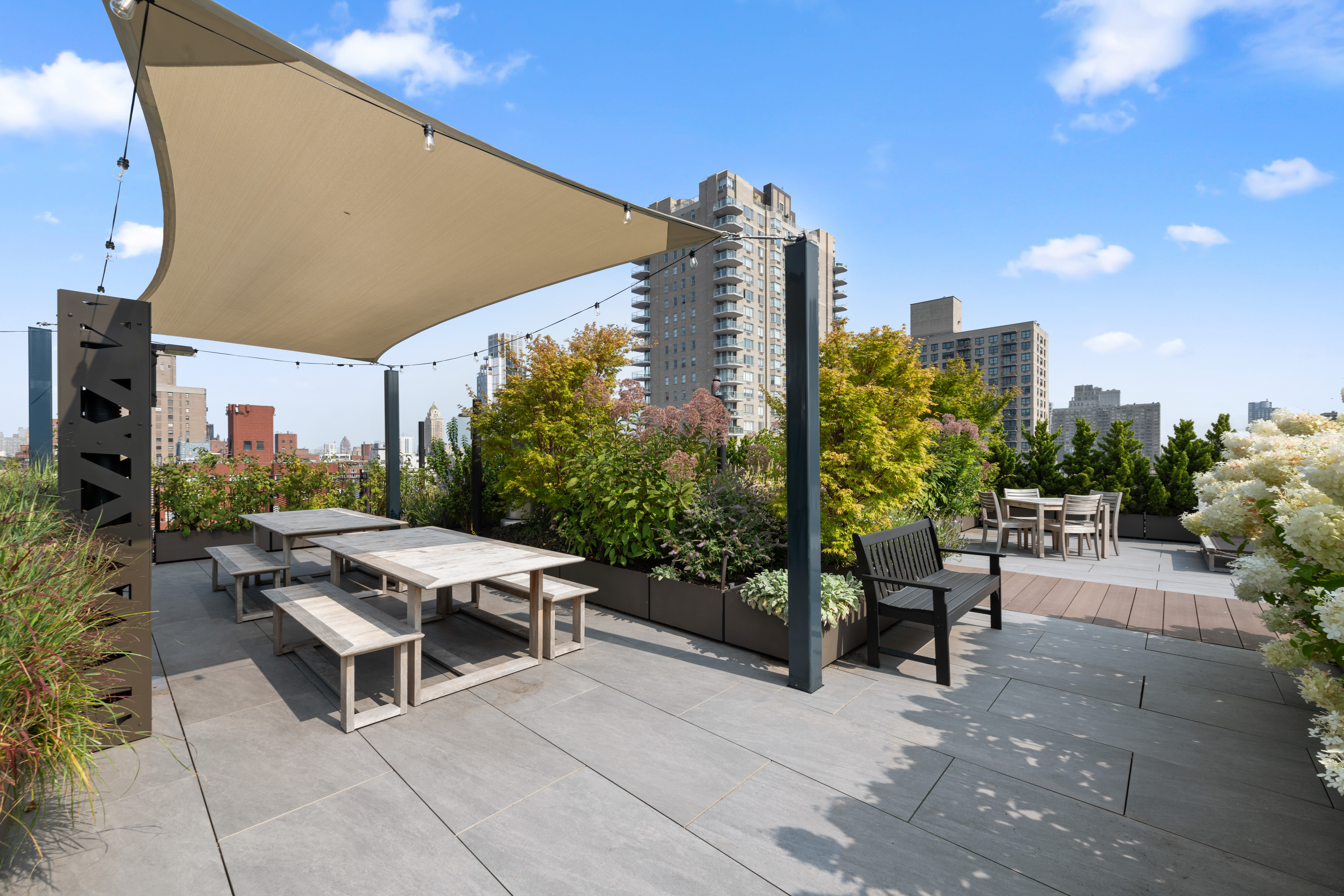 315 East 72nd Street, Unit 15M Manhattan, NY 10021 - Photo 14 of 18 a outdoor space with lots of tables and chairs