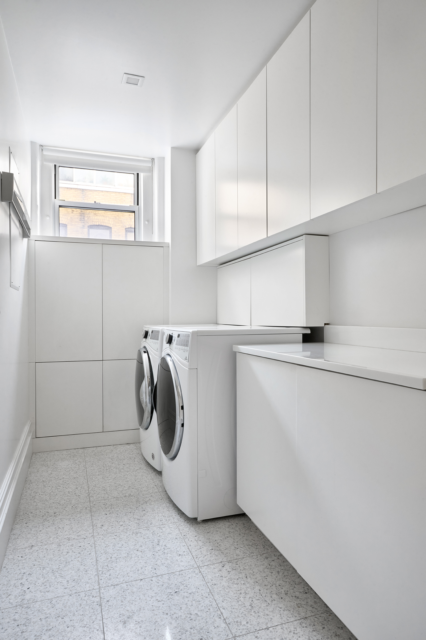 850 Park Avenue, Unit 7D Manhattan, NY 10075 - Photo 19 of 20 a utility room with dryer and washer