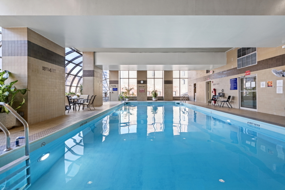 200 East 89th Street, Unit 34CD Manhattan, NY 10128 - Photo 17 of 20 a view of a living room with kitchen