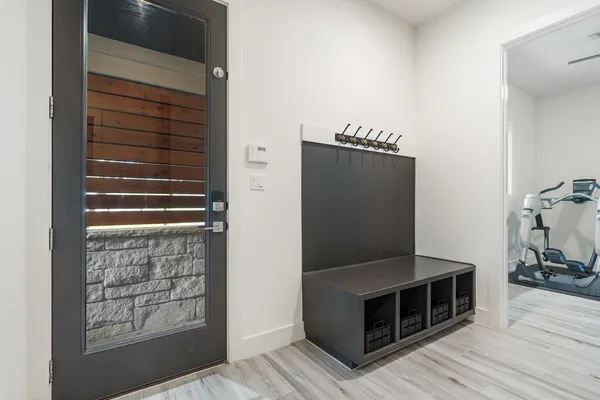 an aerial view of a house with a yard and lake view