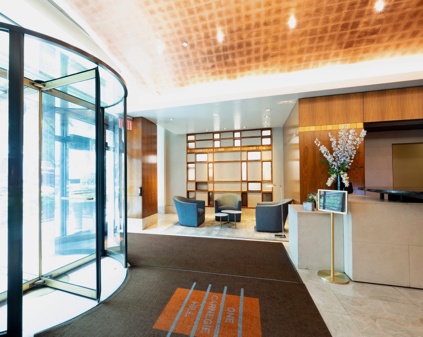 215-217 East 96th Street, Unit 25B Manhattan, NY 10128 - Photo 16 of 19 a living room with furniture and a floor to ceiling window