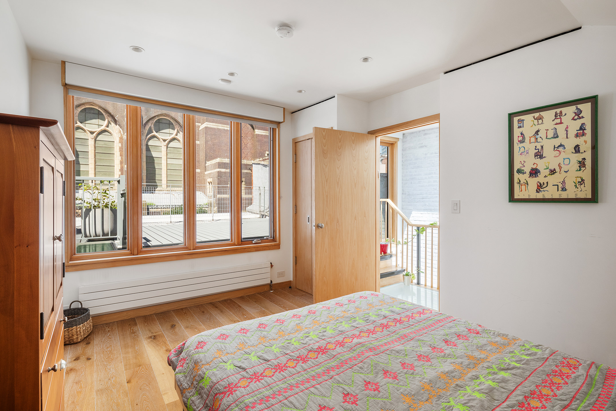 137 St Felix Street Brooklyn, NY 11217 - Photo 9 of 18 a bedroom with a bed and a large window