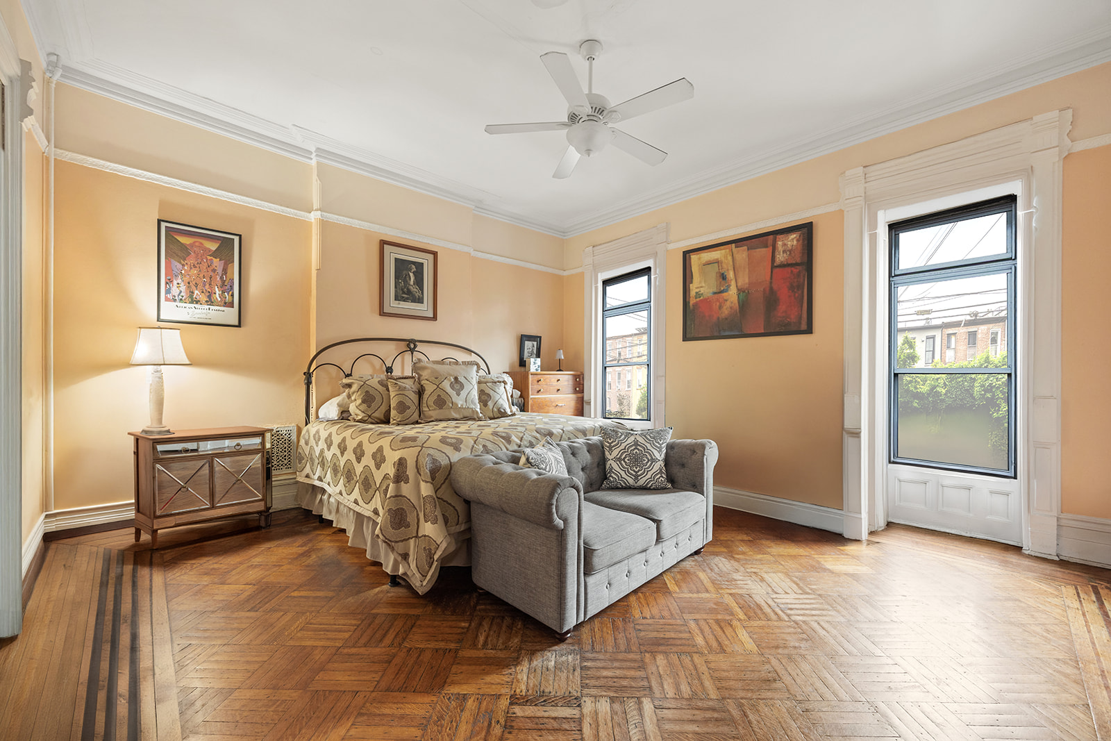 621 Putnam Avenue Brooklyn, NY 11221 - Photo 7 of 19 a spacious bedroom with a bed and a table