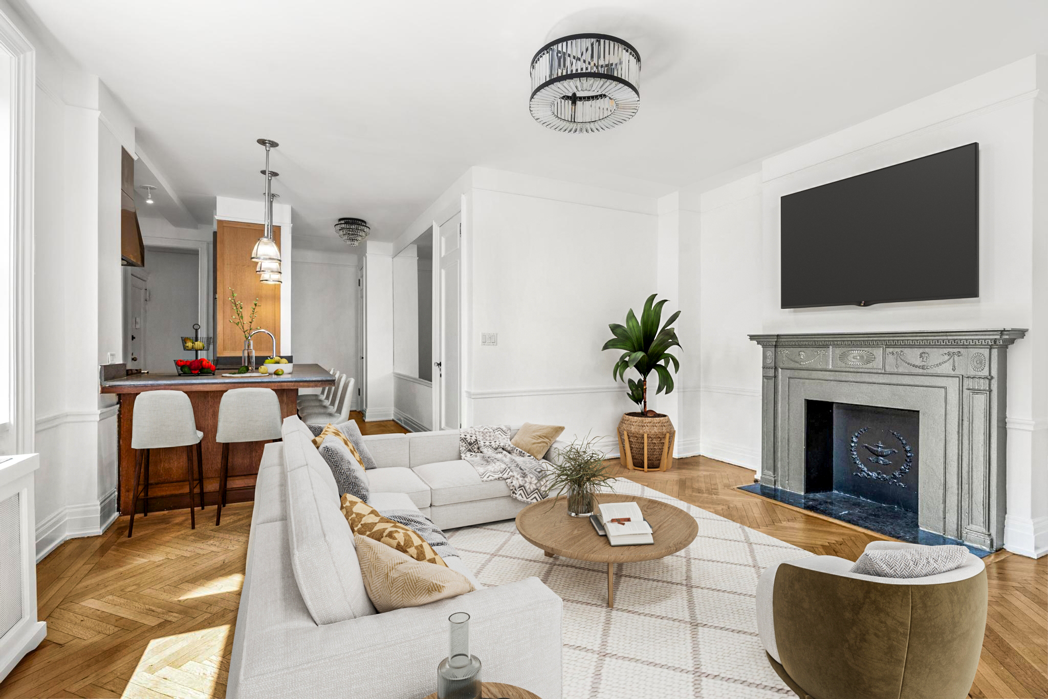 a living room with furniture a flat screen tv and a fireplace