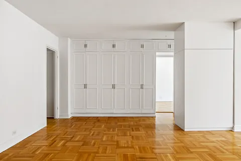 a view of a livingroom with wooden floor