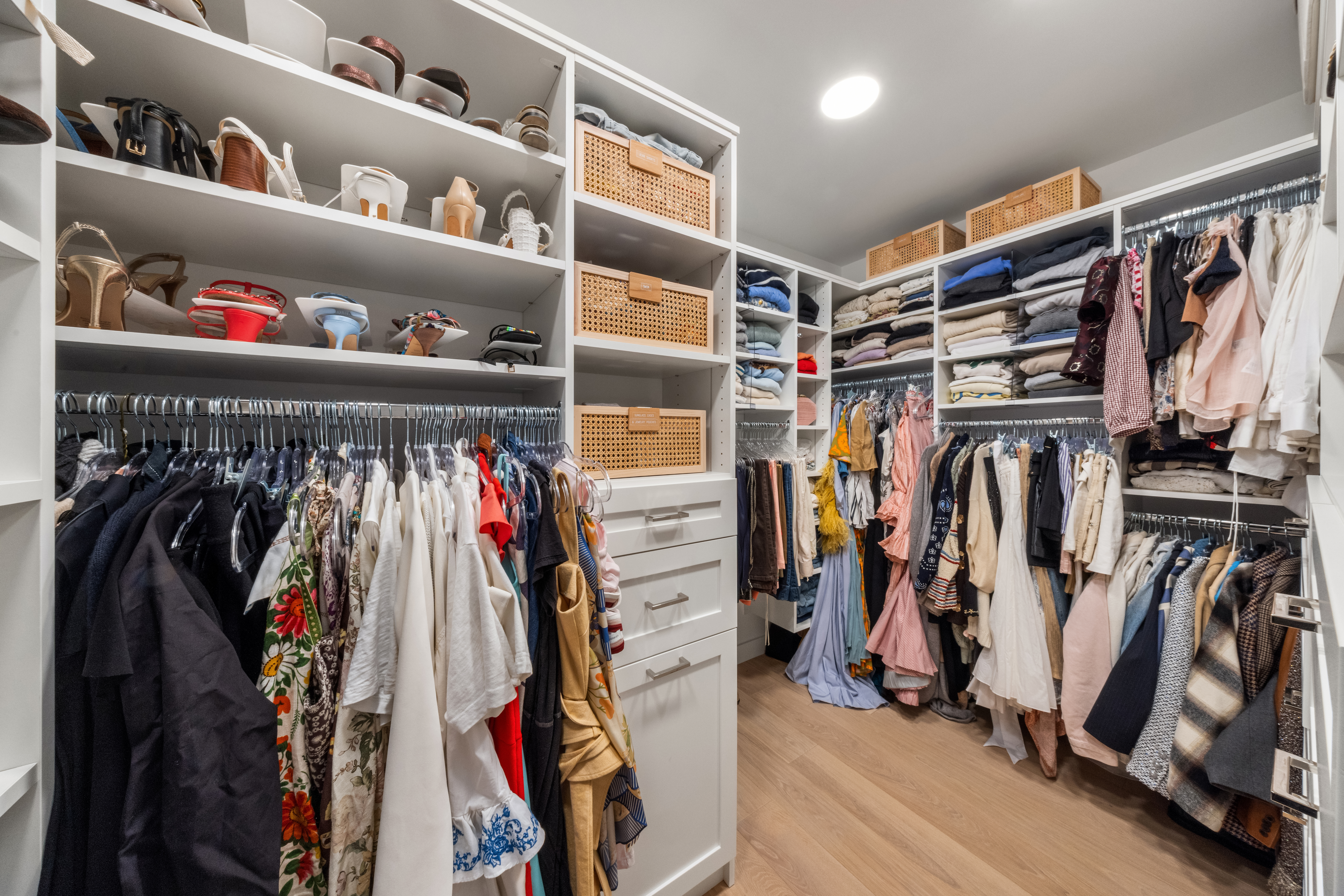 150 East 69th Street, Unit 18S Manhattan, NY 10021 - Photo 11 of 16 a view of walk in closet with clothes and shoes