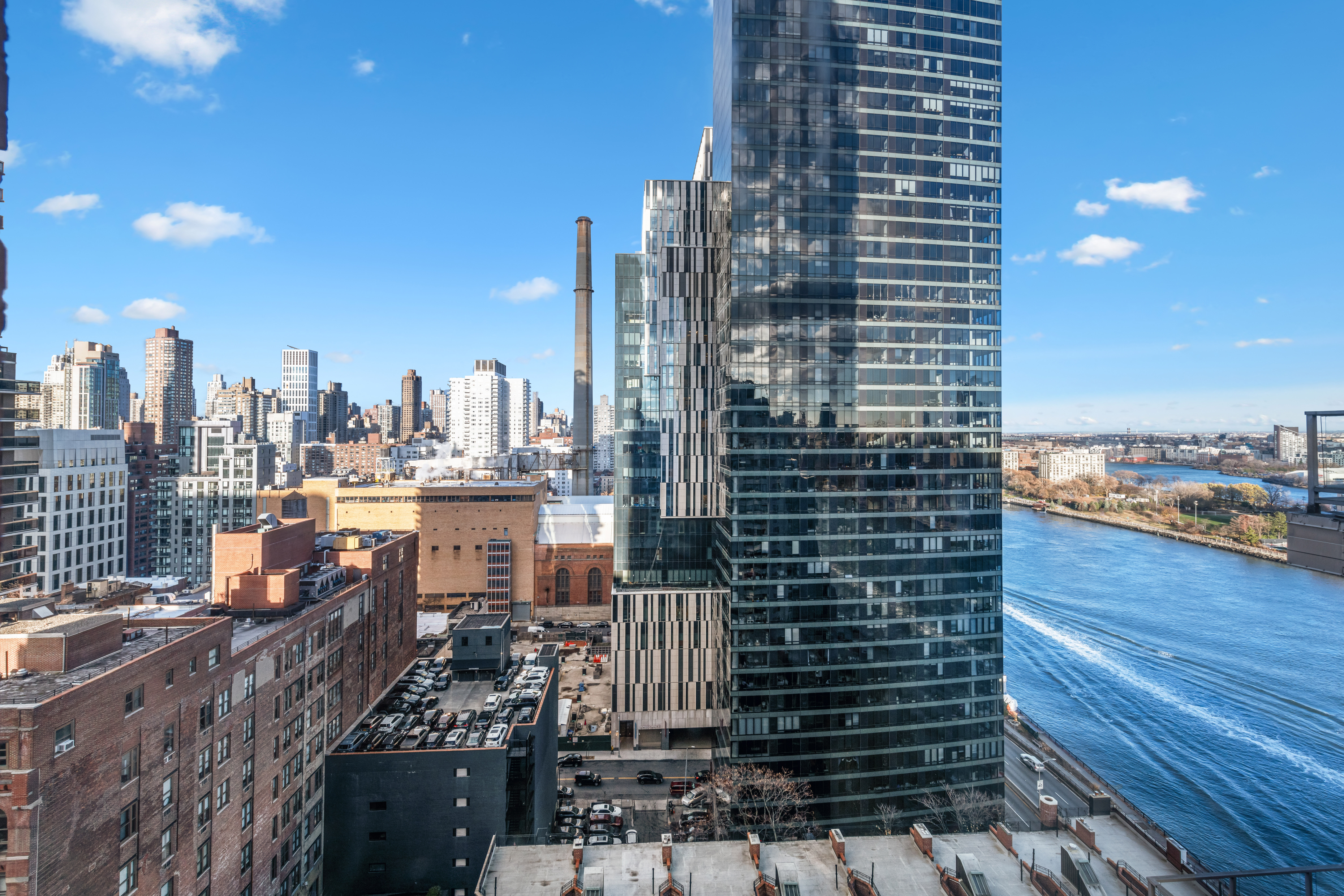 524 East 72nd Street, Unit 24A Manhattan, NY 10021 - Photo 6 of 12 a city view with tall buildings