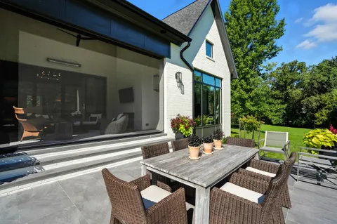 a view of entryway with wooden floor and windows