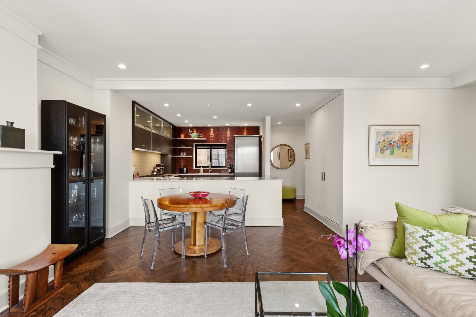 309 West 86th Street, Unit 11B Manhattan, NY 10024 - Photo 6 of 13 a living room with furniture and kitchen view