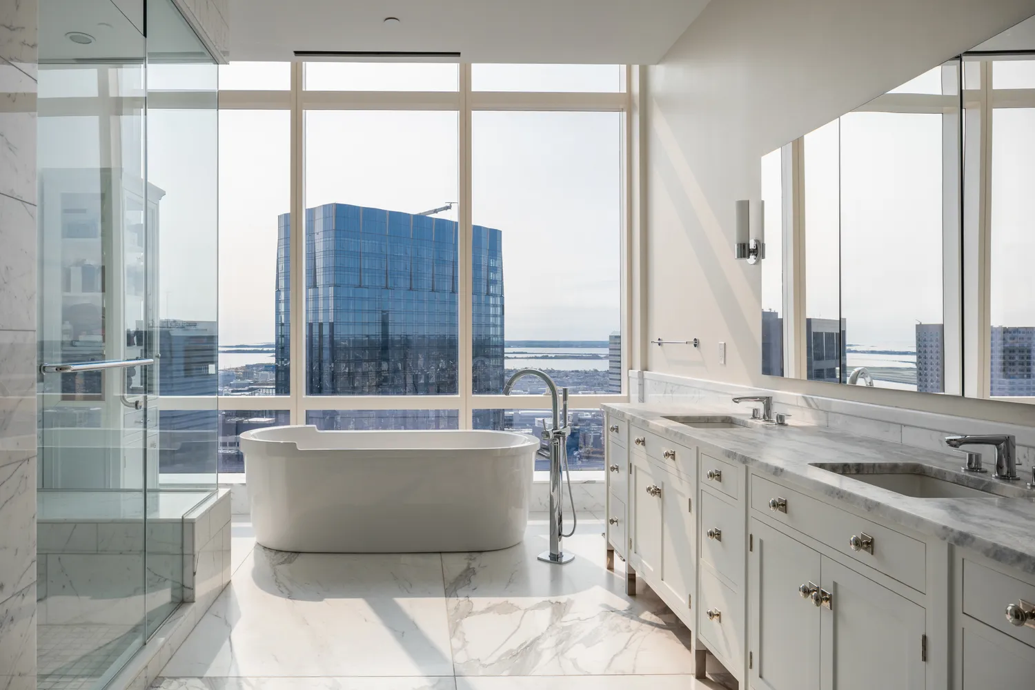 a view of balcony with a large window and couch
