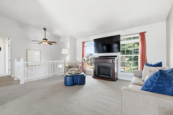 a kitchen with stainless steel appliances granite countertop a refrigerator a stove top oven a sink and dishwasher