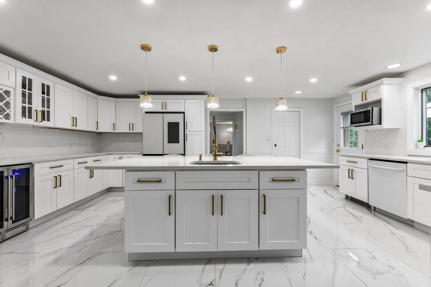 a large kitchen with cabinets