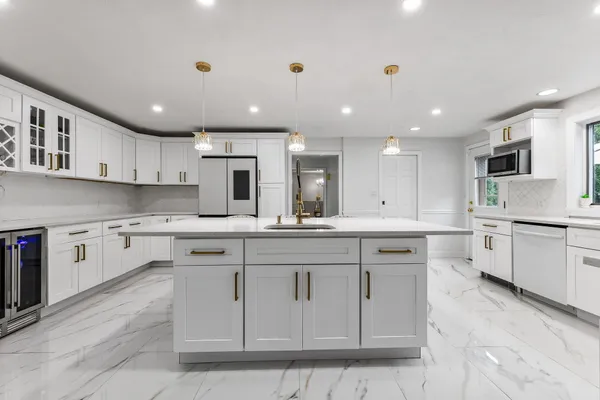 a large kitchen with cabinets
