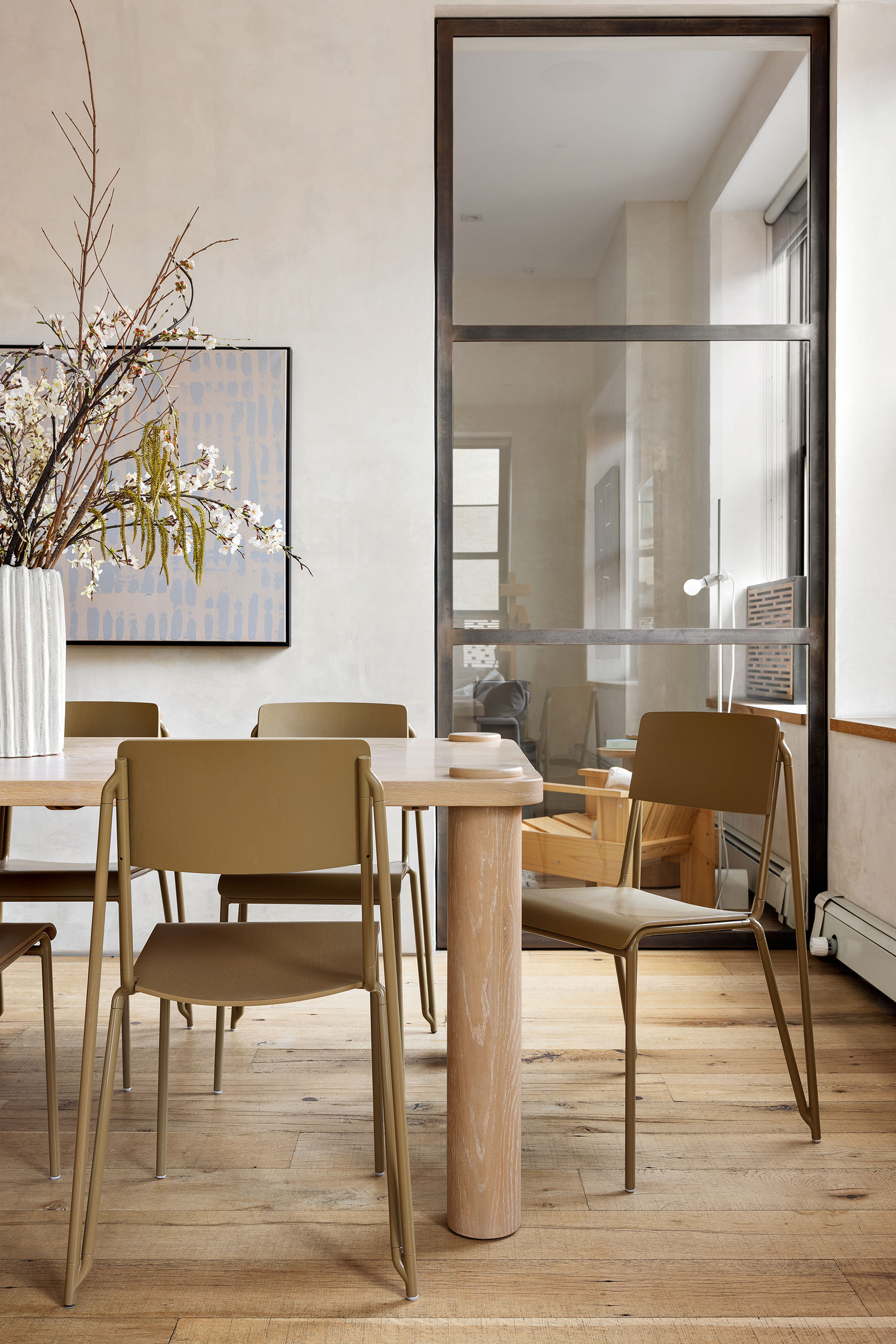 250 Mercer Street, Unit B706B707 Manhattan, NY 10012 - Photo 5 of 25 a view of a dining room with furniture window and wooden floor