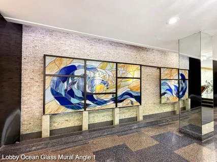 a couple of cars parked in front of a building