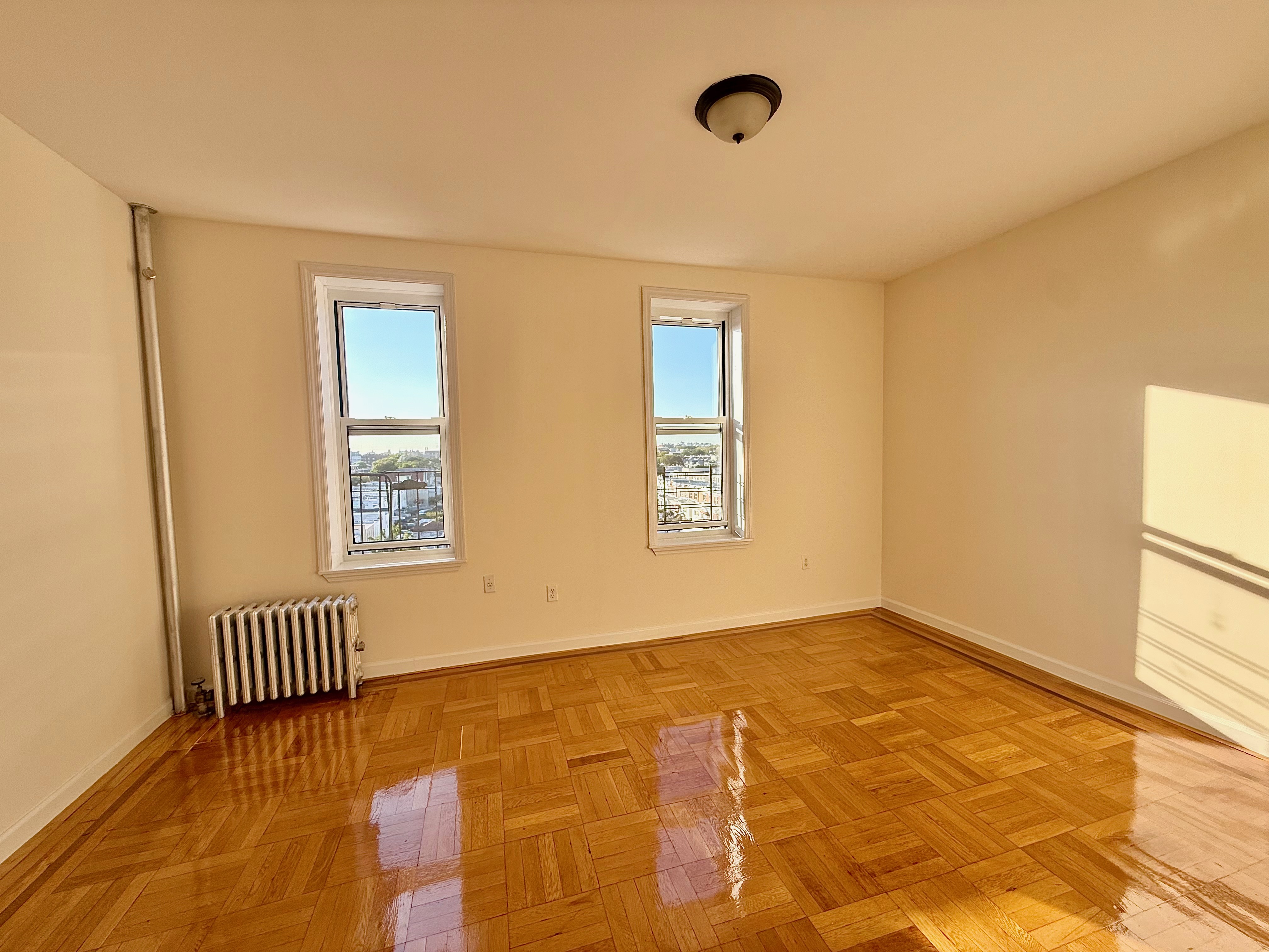 6309 Bay Parkway, Unit F5 Brooklyn, NY 11204 - Photo 4 of 7 a view of an empty room with a window