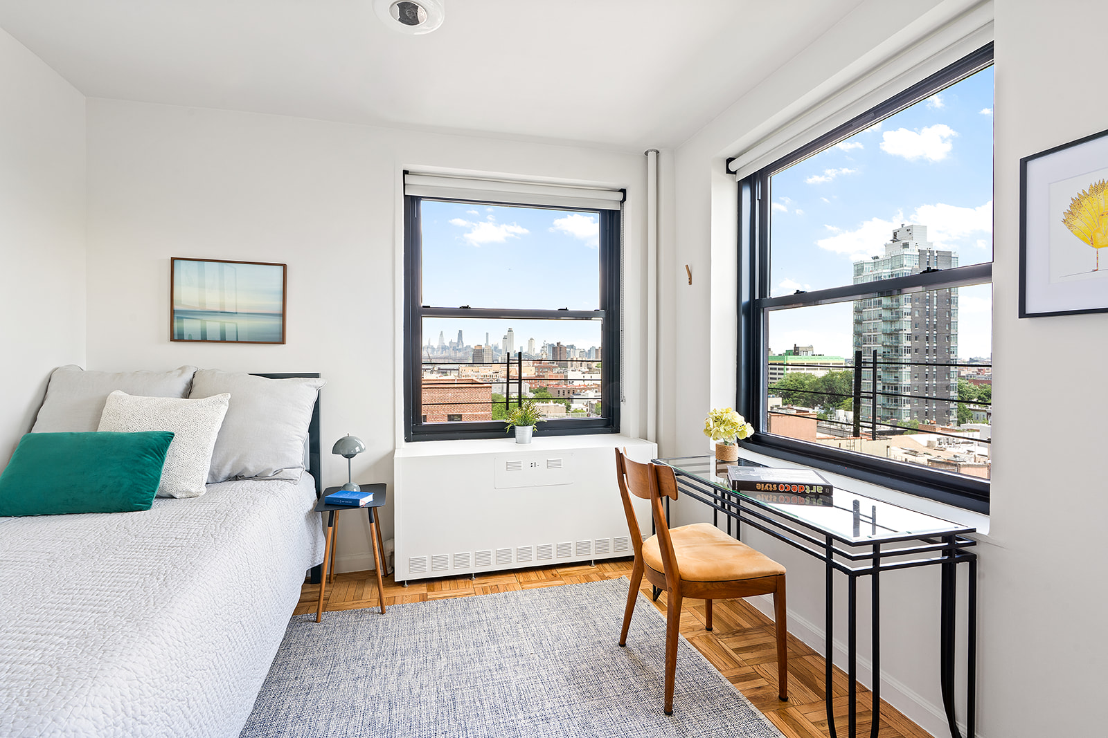 193 Clinton Avenue, Unit 9D Brooklyn, NY 11205 - Photo 4 of 11 a living room with furniture and a window