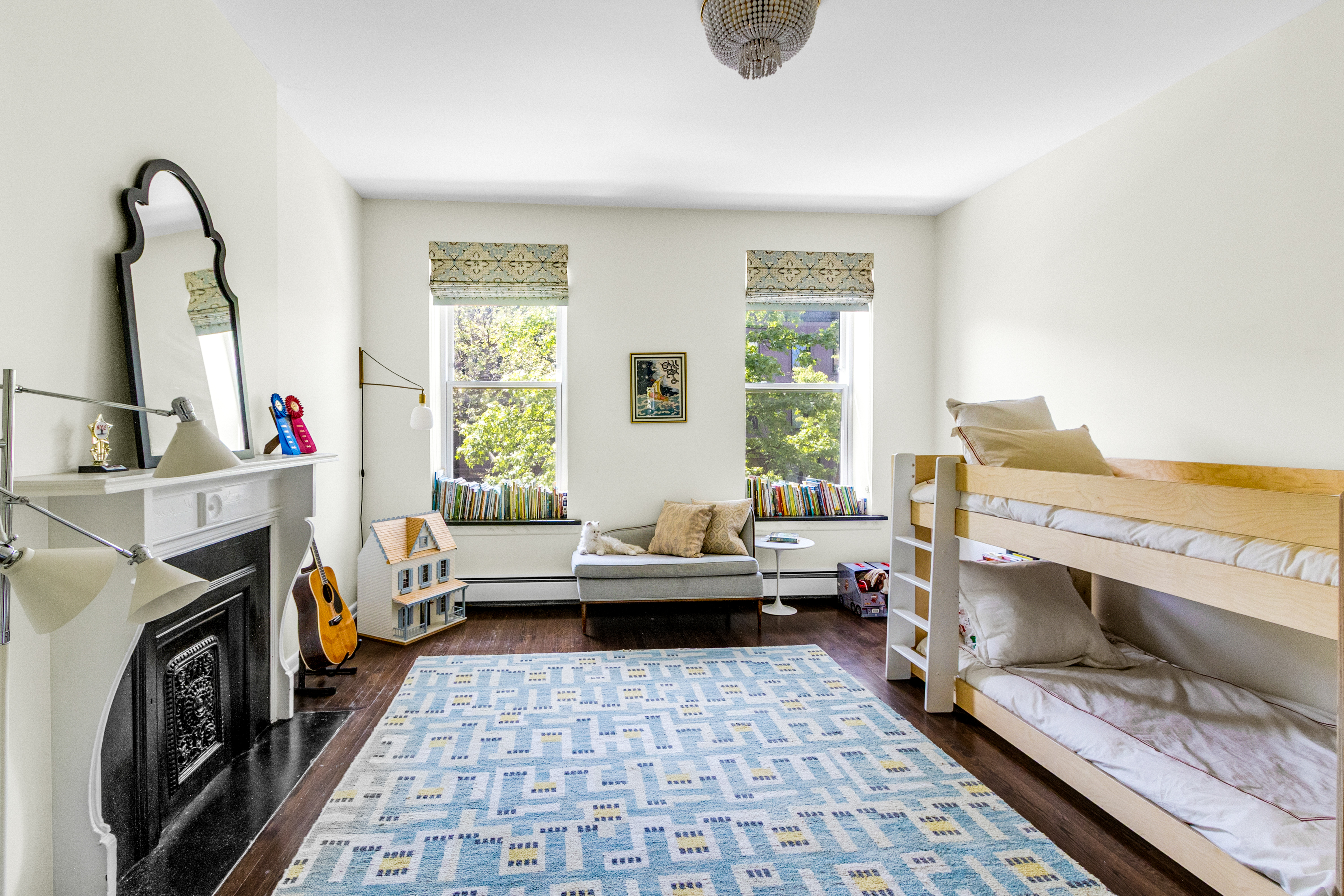 125 West 132nd Street Manhattan, NY 10027 - Photo 14 of 21 a living room with furniture and a fireplace