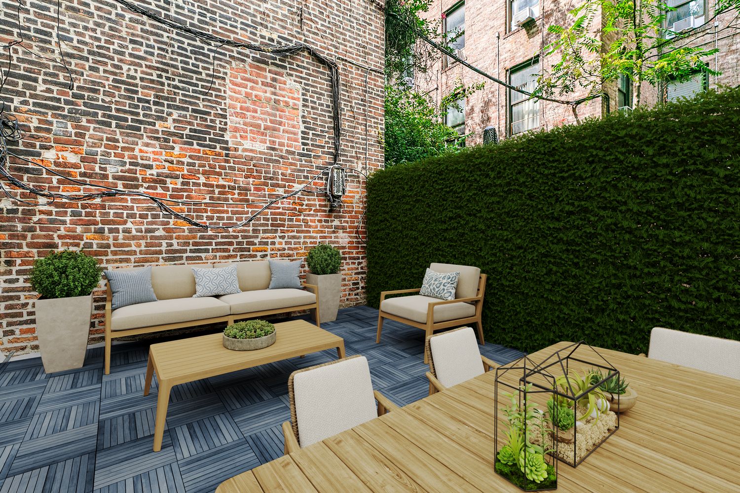 a view of a patio with couches chairs and wooden floor