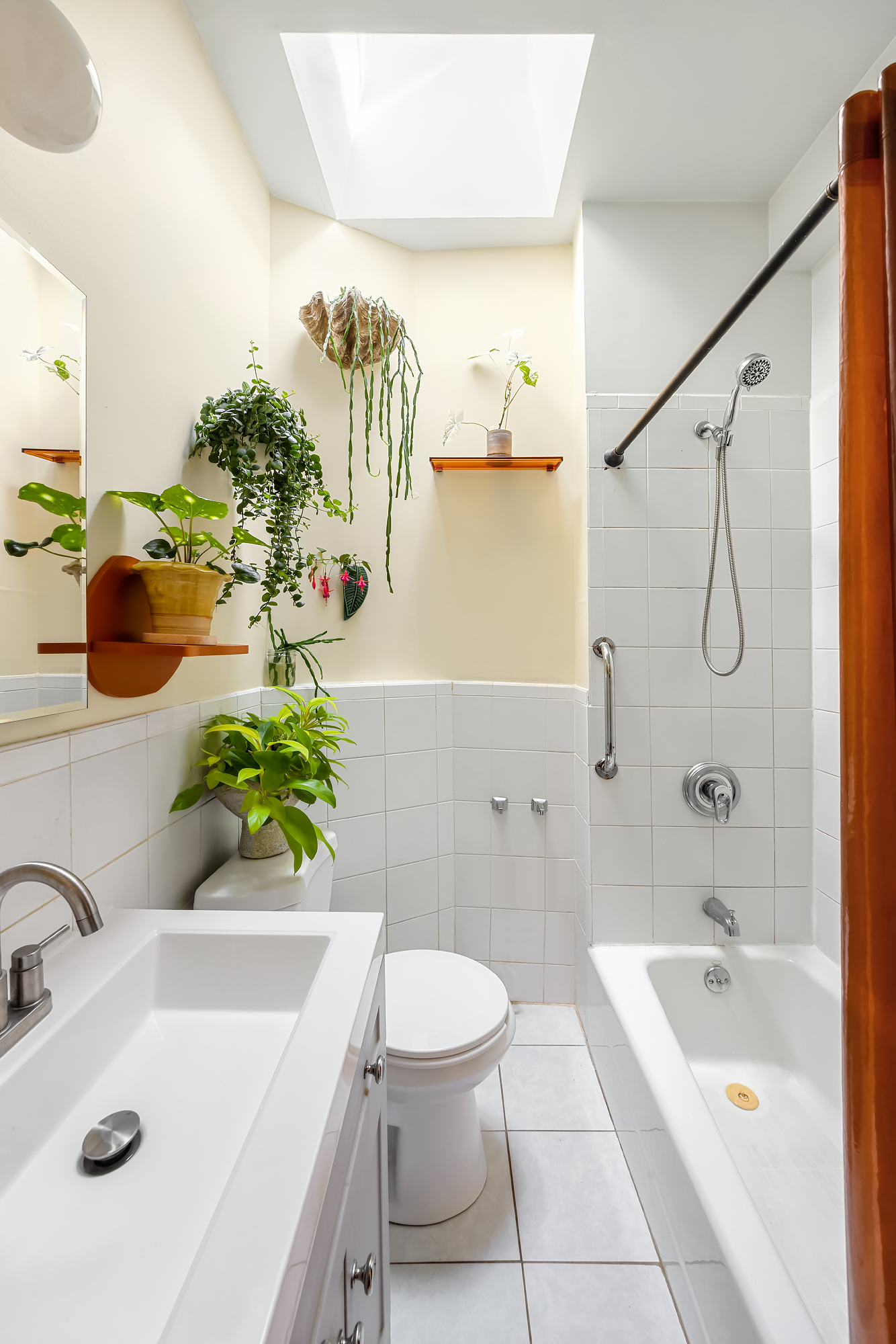 18 Russell Street Brooklyn, NY 11222 - Photo 8 of 24 a bathroom with a sink a toilet and shower