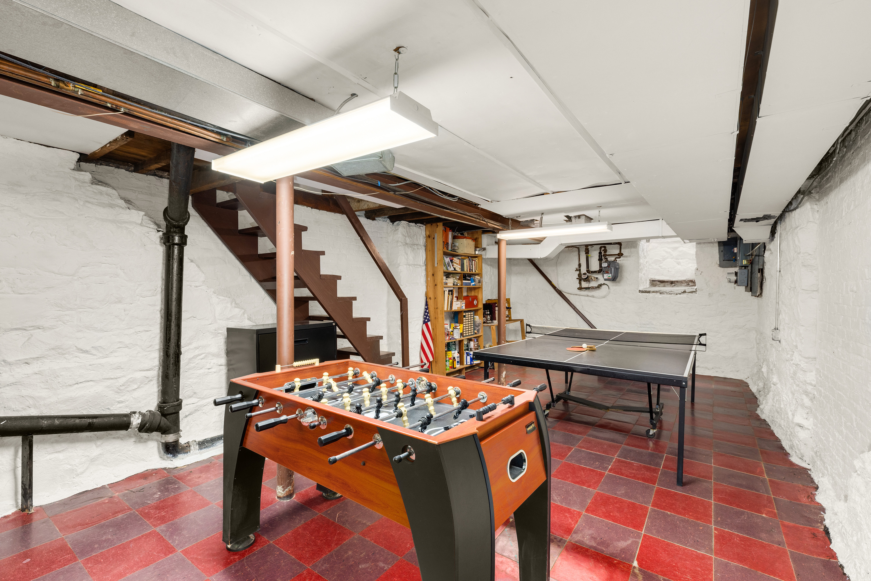 301 A 13th Street Brooklyn, NY 11215 - Photo 14 of 16 a room with table and wooden floors