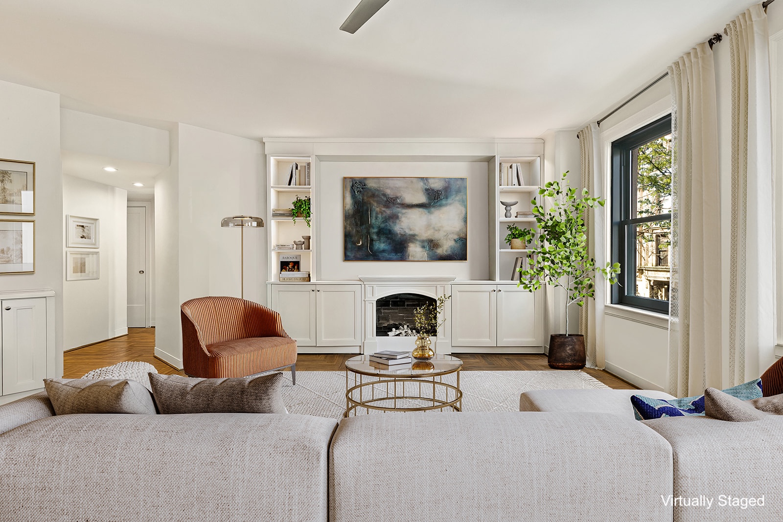 300 West 108th Street, Unit 2C Manhattan, NY 10025 - Photo 2 of 16 a living room with furniture and a fireplace