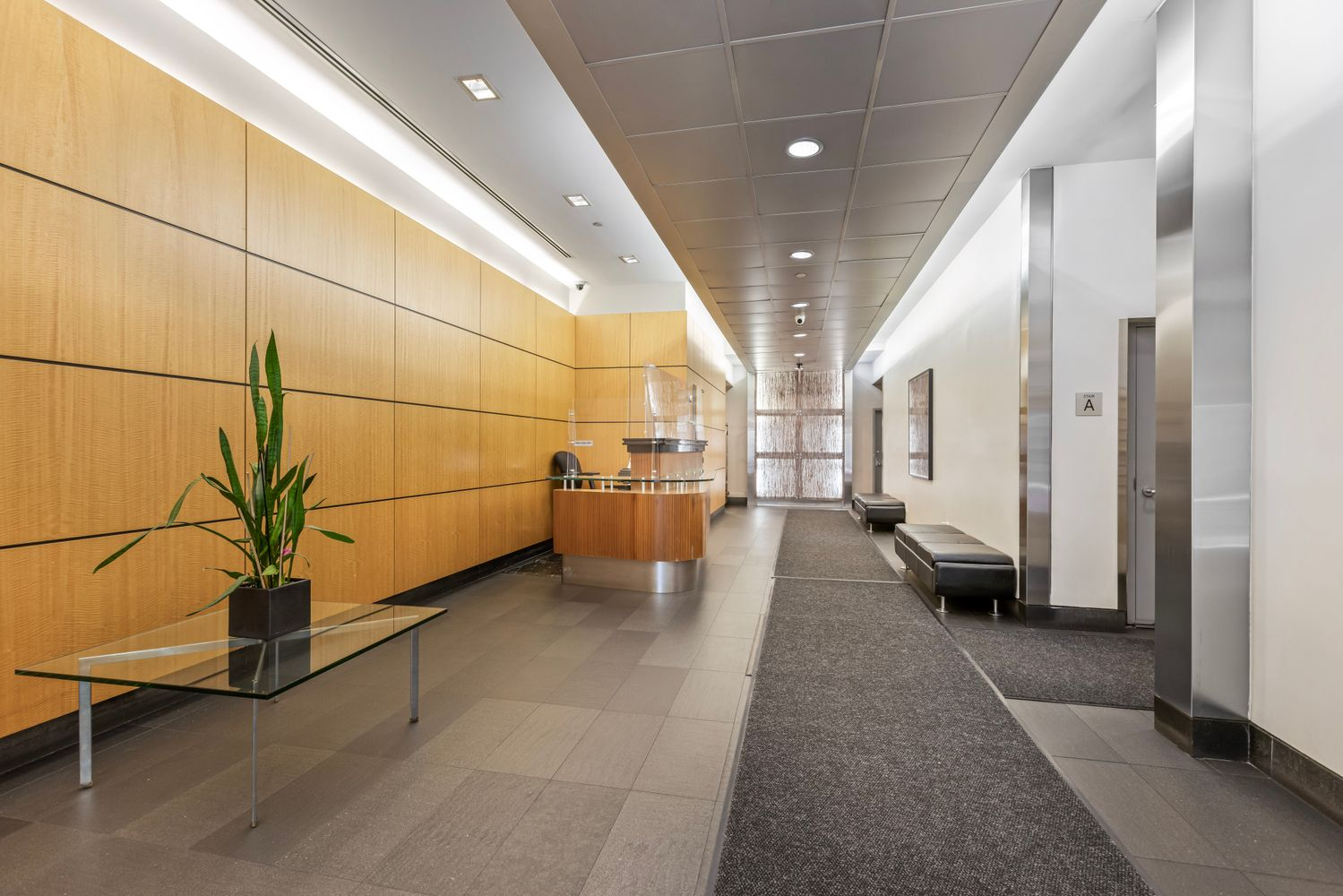 257 West 117th Street, Unit 2G Manhattan, NY 10026 - Photo 9 of 11 a view of a hallway with couch