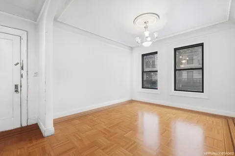 a view of an empty room with a window