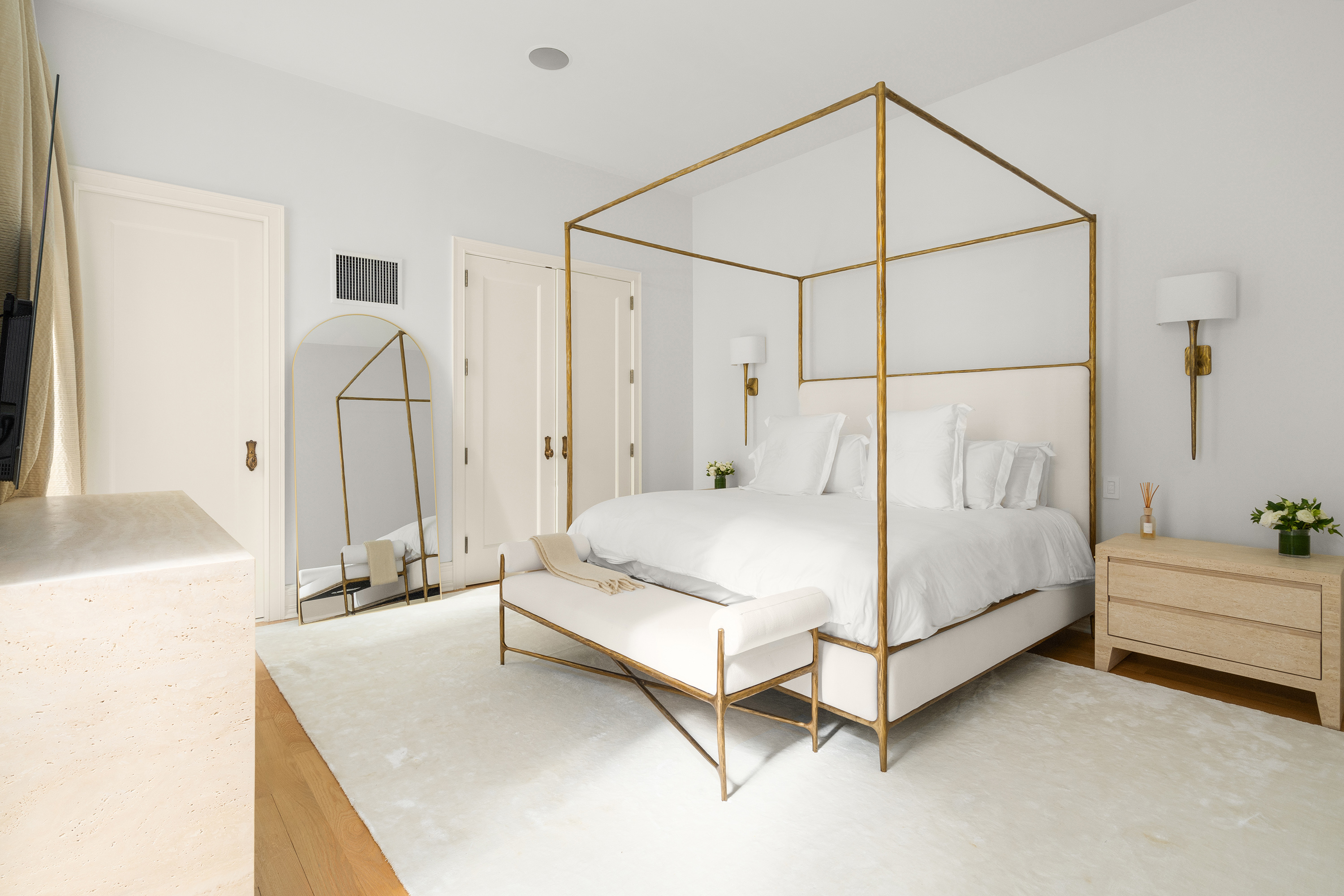 1 Central Park South, Unit 1010 Manhattan, NY 10019 - Photo 3 of 11 a spacious bedroom with a bed and a cabinets