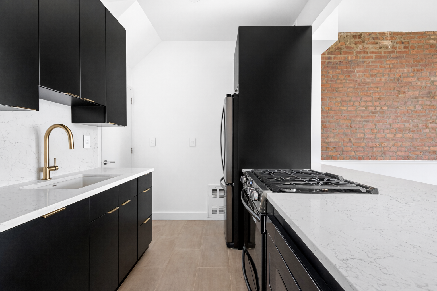 521 East 6th Street, Unit 5S Manhattan, NY 10009 - Photo 2 of 9 a kitchen with a sink stove and refrigerator