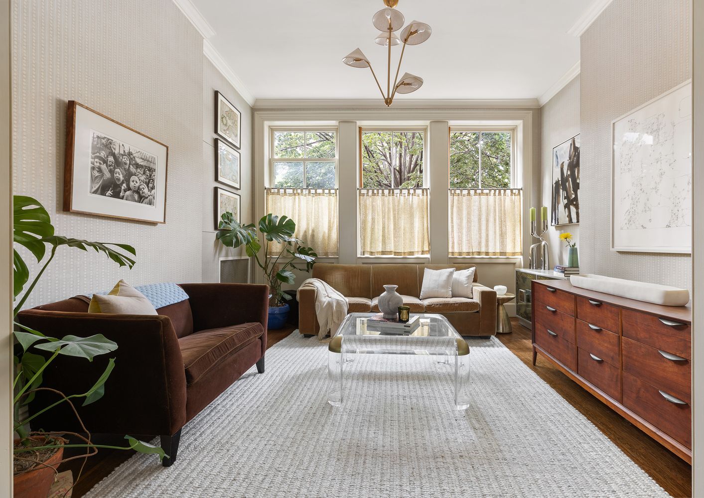a living room with furniture or couch and a window