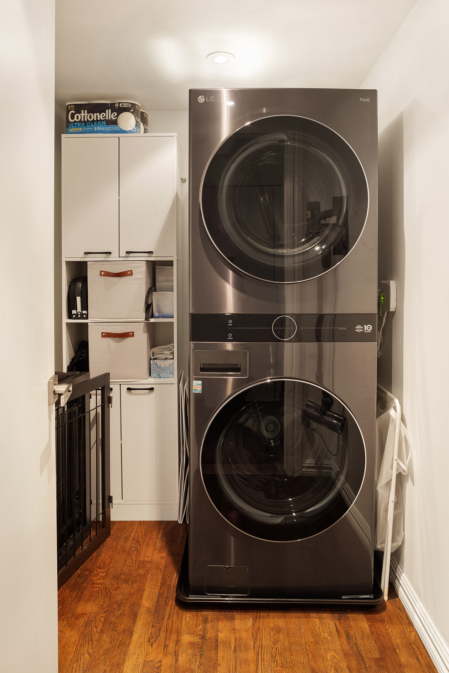 250 Mercer Street, Unit C302 Manhattan, NY 10012 - Photo 14 of 24 a utility room with dryer and washer