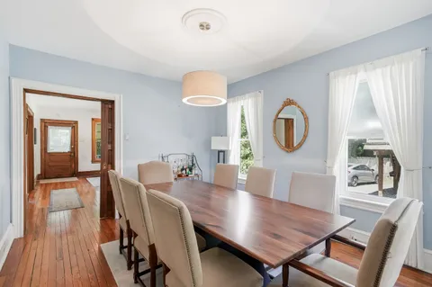a kitchen with stainless steel appliances granite countertop a stove and a refrigerator