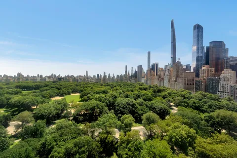 a view of a city with tall buildings