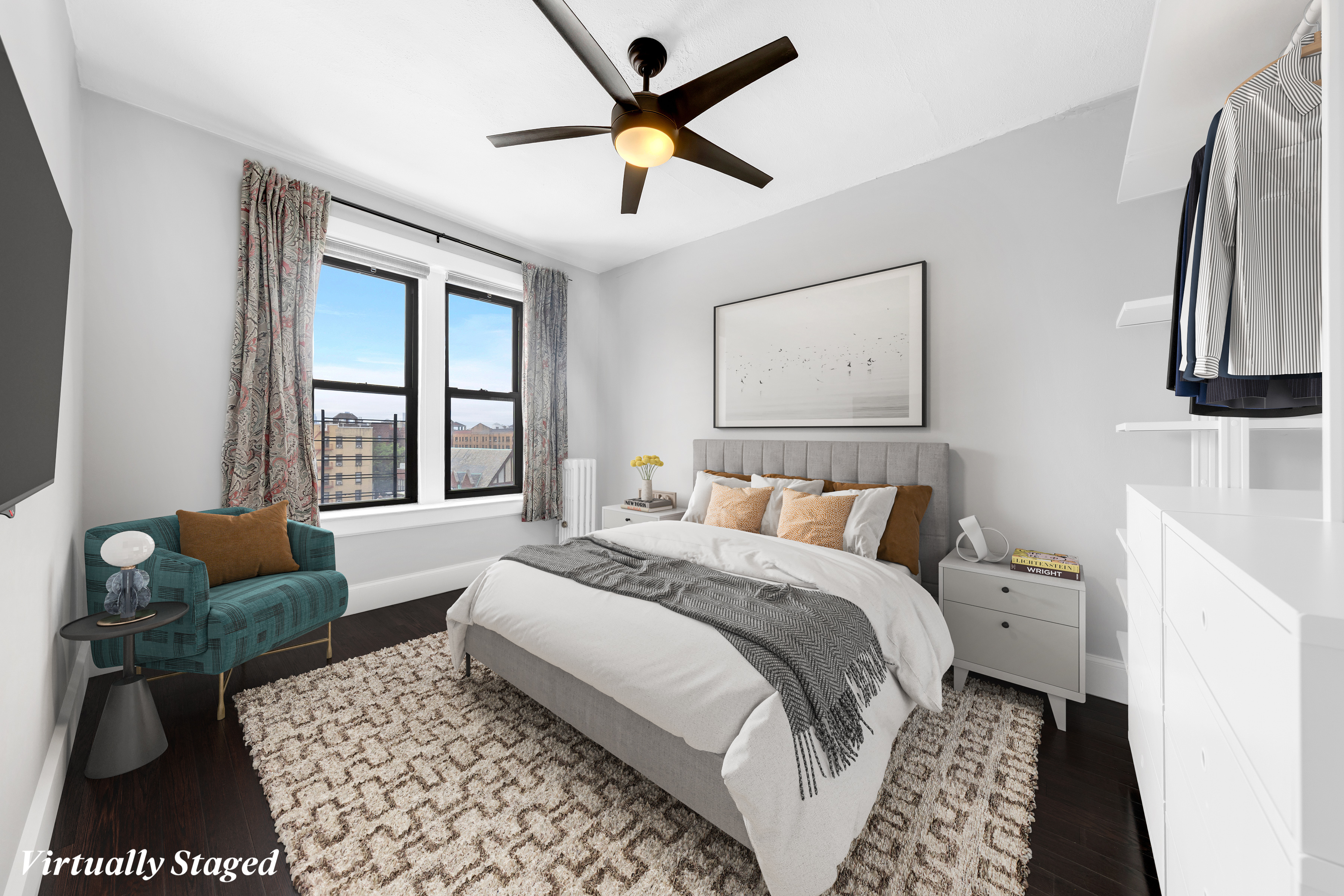 37-20 83rd Street, Unit 6J Queens, NY 11372 - Photo 9 of 14 a bedroom with a bed couch and a window