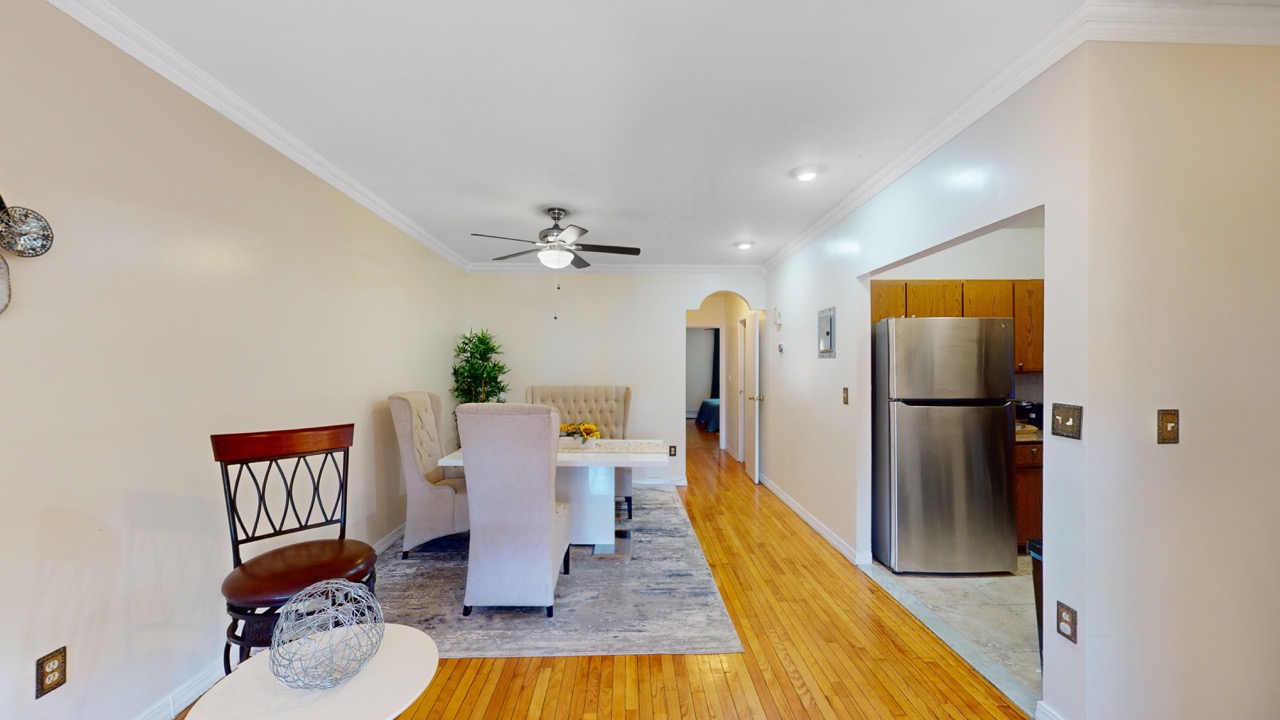 495 Central Avenue, Unit 2 Brooklyn, NY 11221 - Photo 4 of 19 a bed room with furniture and wooden floor