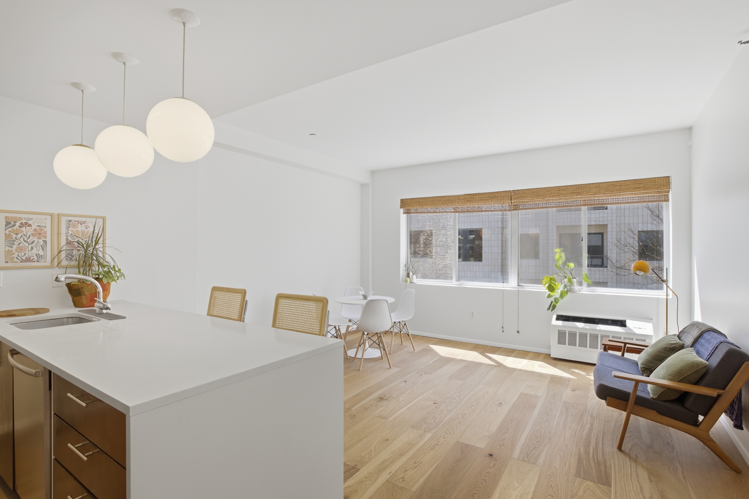 433 Warren Street, Unit 2C Brooklyn, NY 11217 - Photo 1 of 19 a living room with furniture and a window