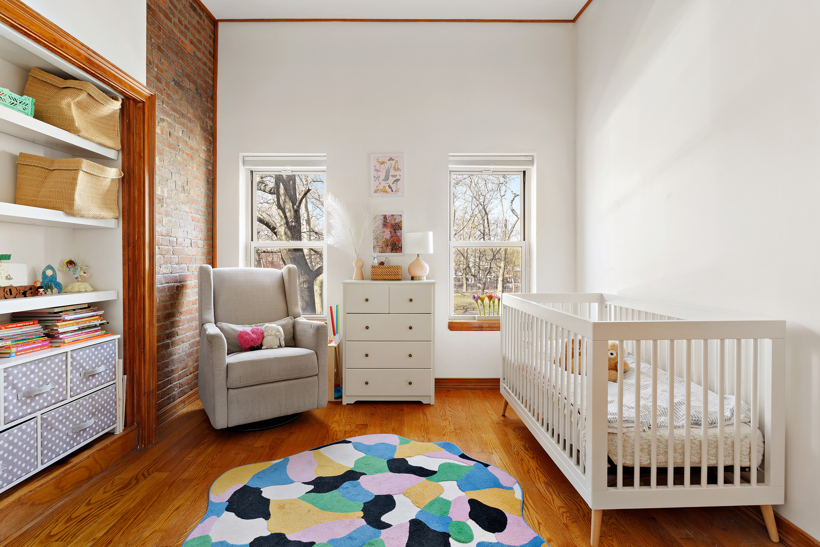 171 Monitor Street Brooklyn, NY 11222 - Photo 7 of 11 a bedroom with furniture and a window