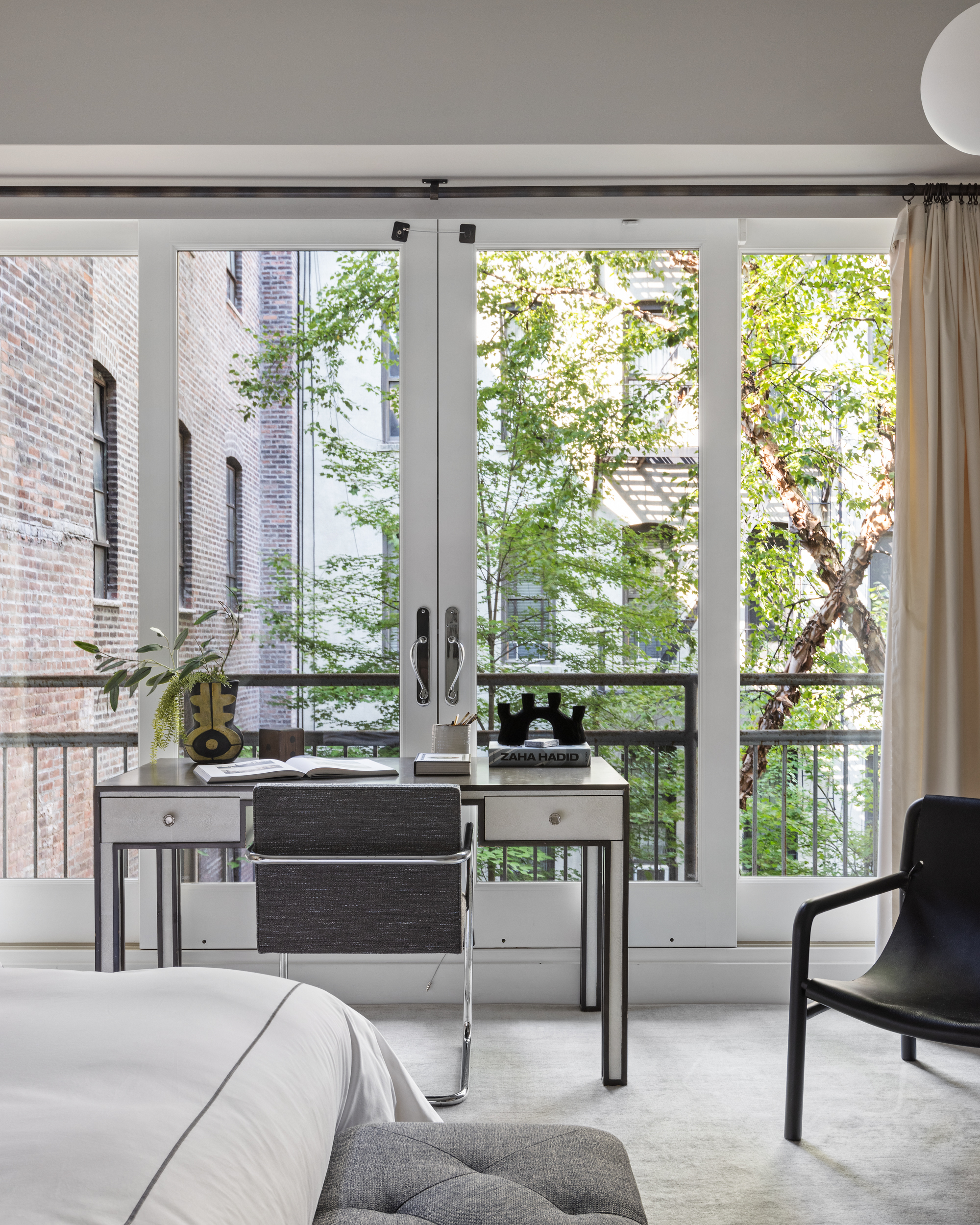 95 Charles Street, Unit TH Manhattan, NY 10014 - Photo 18 of 29 a living room with furniture and a large window