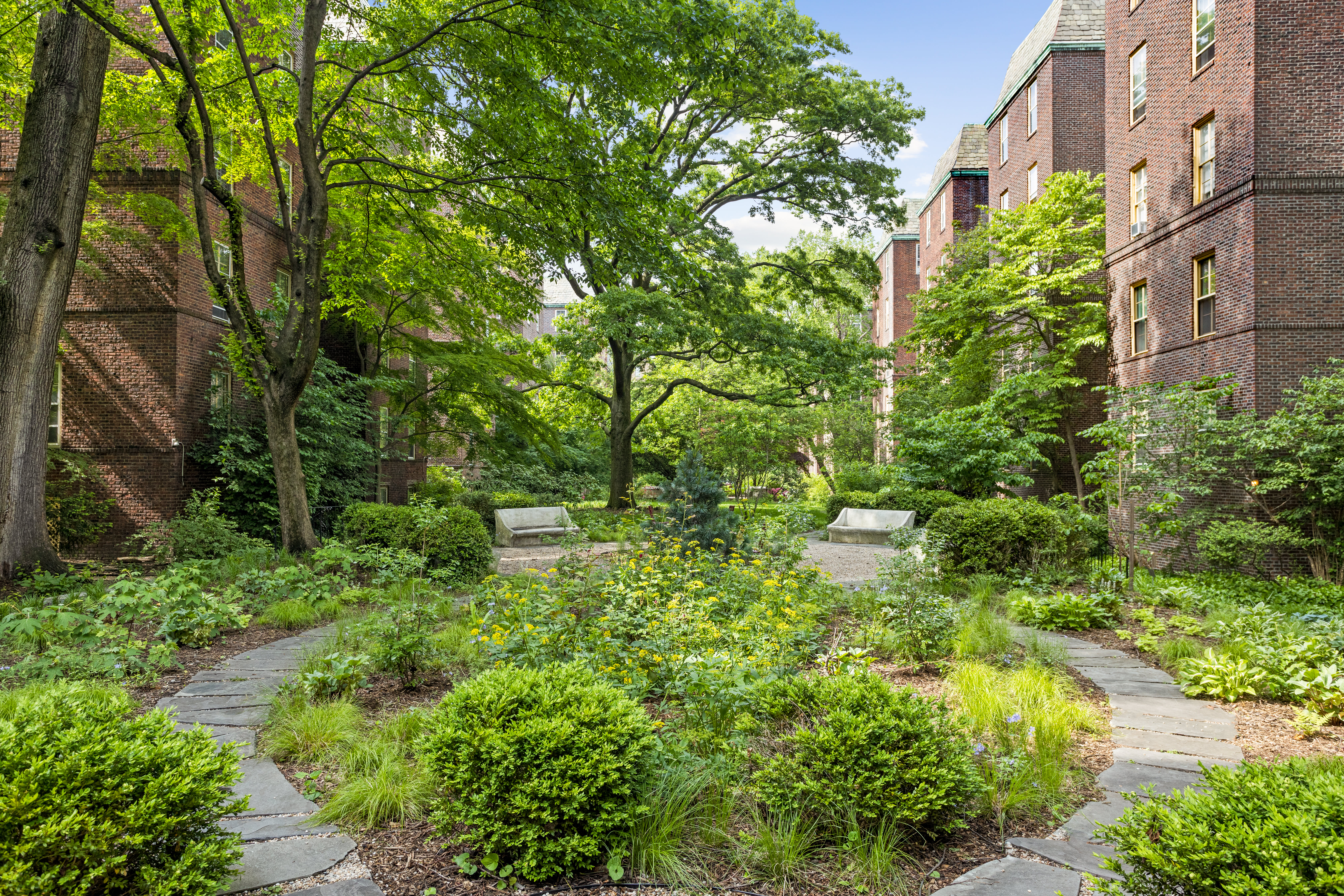 34-06 81st Street, Unit 31 Queens, NY 11372 - Photo 2 of 3 an aerial view of residential house with outdoor space and trees all around