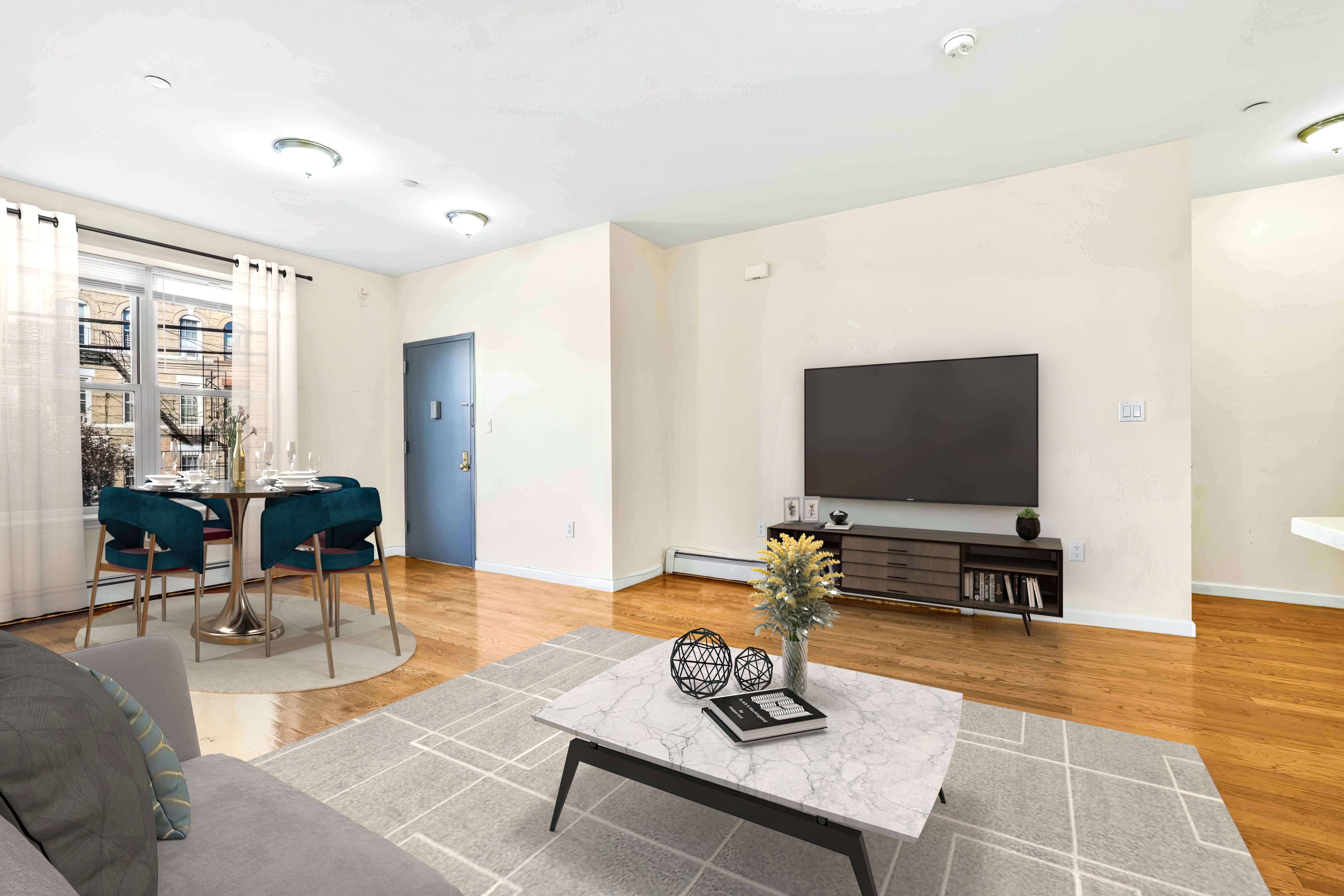 1892 Bergen Street, Unit 2 Brooklyn, NY 11233 - Photo 11 of 24 a living room with furniture and a flat screen tv