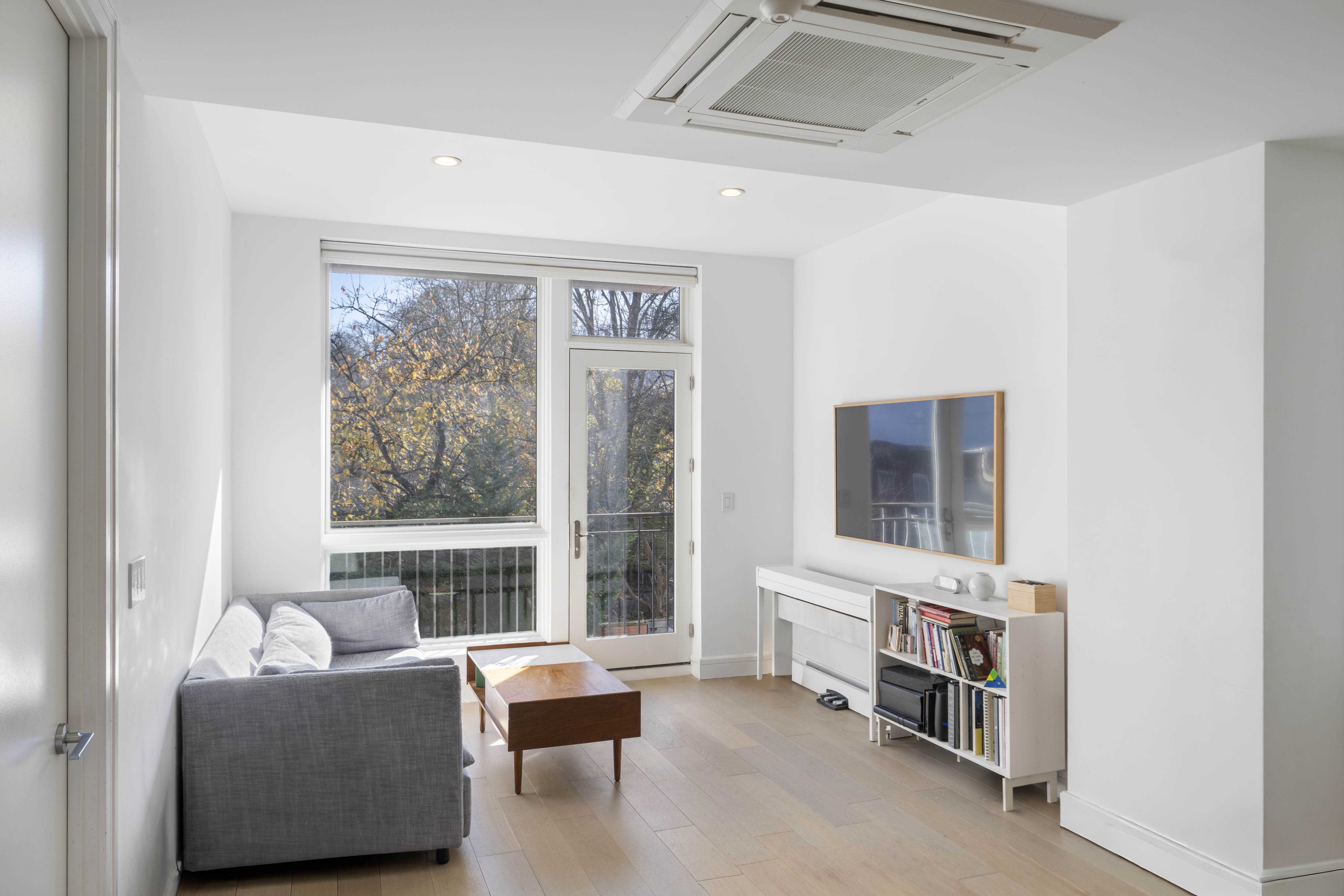 695 6th Avenue, Unit 2P Brooklyn, NY 11215 - Photo 3 of 15 a living room with furniture and a window