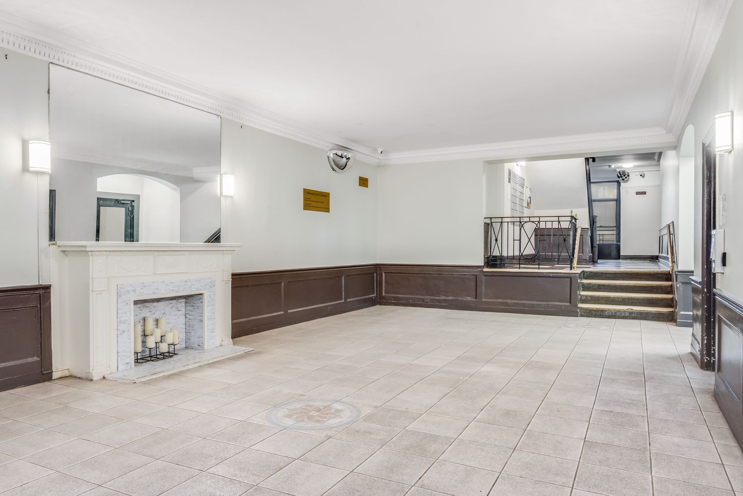 40 Clarkson Avenue Brooklyn, NY 11226 - Photo 6 of 18 a view of an empty room with a fireplace