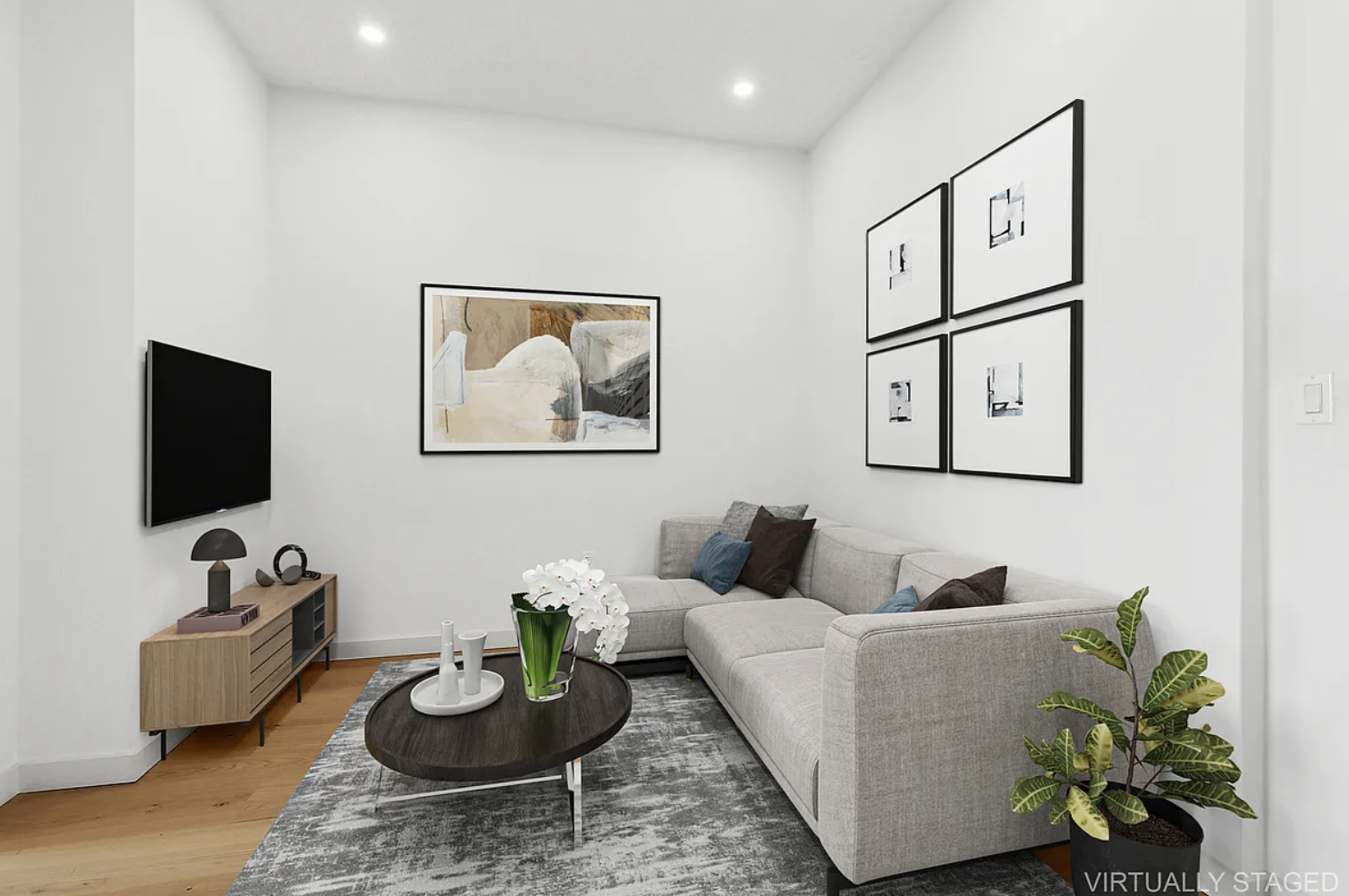 138 Schaefer Street, Unit 3 Brooklyn, NY 11207 - Photo 2 of 11 a living room with furniture and a flat screen tv